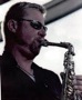 Jeff Baird playing saxophone in concert.