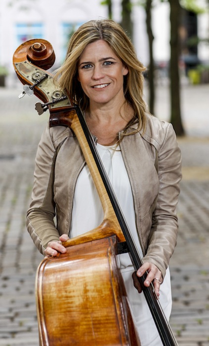 Kristin Korb holding her upright bass.